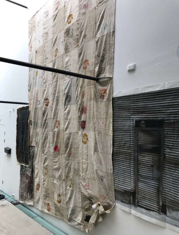 Ari Bayuaji, Alternative Wall, from the series No Place Like Home, 2017, old money bags made of canvas stitched together and digital printing on canvas, 500 x 300 cm